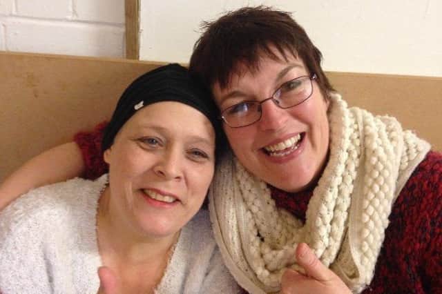 Amanda Phillips with Charlotte Harris, who has a rare form of bowel cancer