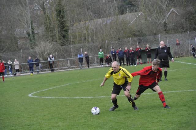 Rye Town and Icklesham Casuals battle it out at The Salts on Saturday.
