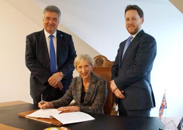 L-R: Adur District Council leader Neil Parkin, West Sussex County Council leader Louise Goldsmith and Worthing Borough Council leader Dan Humphreys at the signing of the growth deal SUS-170321-113933001