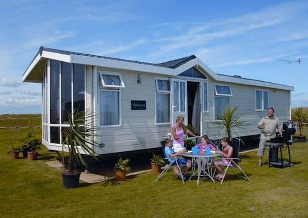 A family enjoying their stay at the Selsey holiday park in 2012