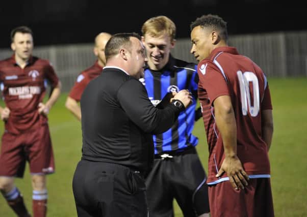 The referee has a word with the two number 10s, Wes Tate and Paul Weatherby. Pictures by Simon Newstead