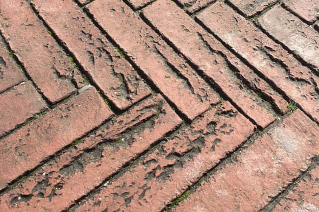 The bricks in Holder's Corner, Montague Place - are they worn or are these 'creases' part of the design?