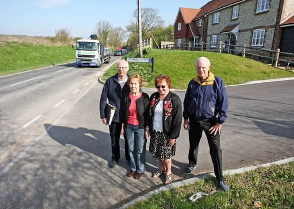 Barry Burks (left) next to his wife Jean at a section of Titnore Lane without a footpath. Picture: Derek Martin