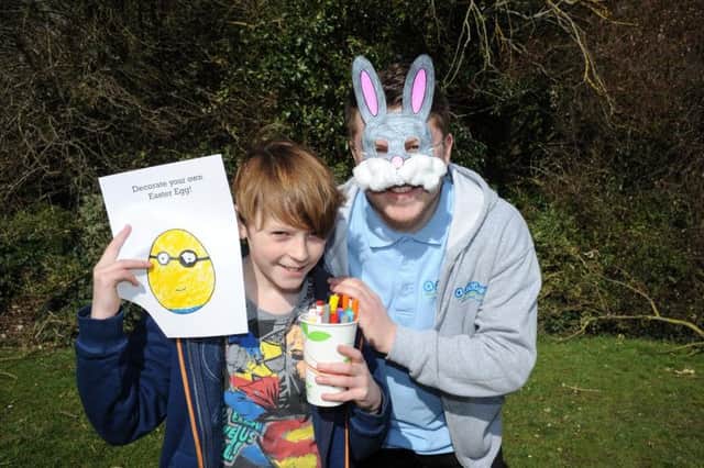 Judah Fuller, aged 10, and Mikey Vickery-Brown have fun making Easter masks at the Arun Community Church stall. Children are invited to join in fun Easter sessions this April