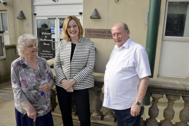 Amber Rudd with residents during her visit to Marlborough House. Picture by The Imageworks SUS-170322-124736001
