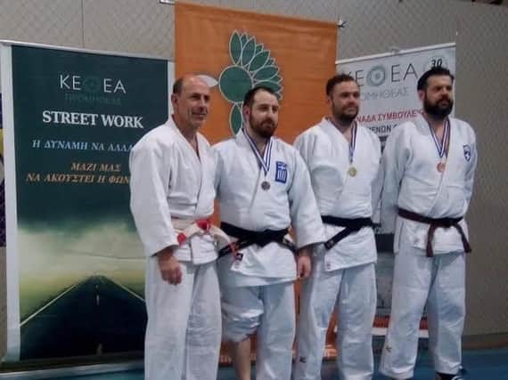 Worthing Judo Club's Ross Elliott (second from right).