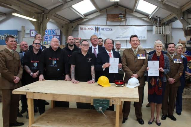 Chichester College signed an Armed Forces Covenant at Brinsbury Campus, which runs a Building Heroes training scheme for veterans.