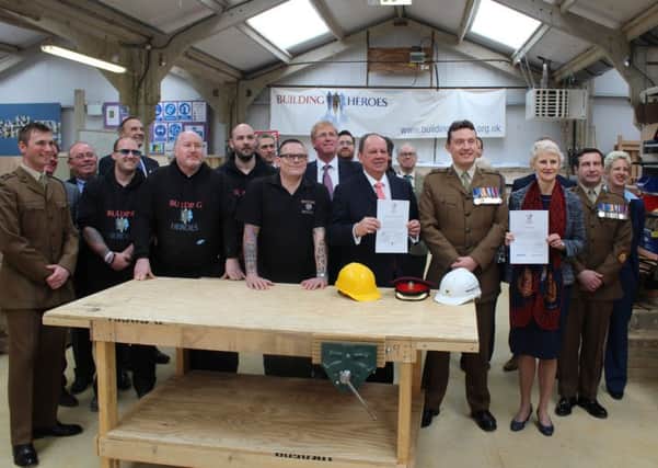 Chichester College signed an Armed Forces Covenant at Brinsbury Campus, which runs a Building Heroes training scheme for veterans.