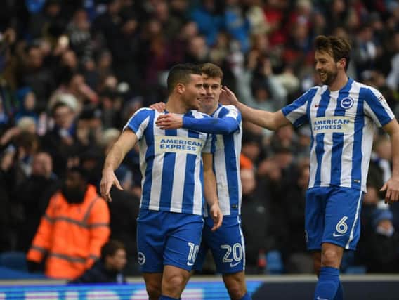 Tomer Hemed, Solly March and Dale Stephens celebrate a Albion goal this season. Picture by Phil Westlake (PW Sporting Photography)