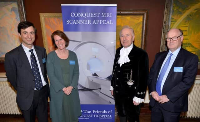 L-R: Simon Baer FRCS, Dr Lesley Apthorp FRCR, Michael Foster and Douglas Flint CBE at the launch of the Conquest MRI scanner appeal. SUS-170324-111659001