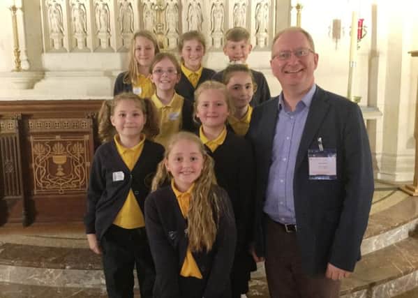Pupils from Upper Beeding Primary School with David Lawrence