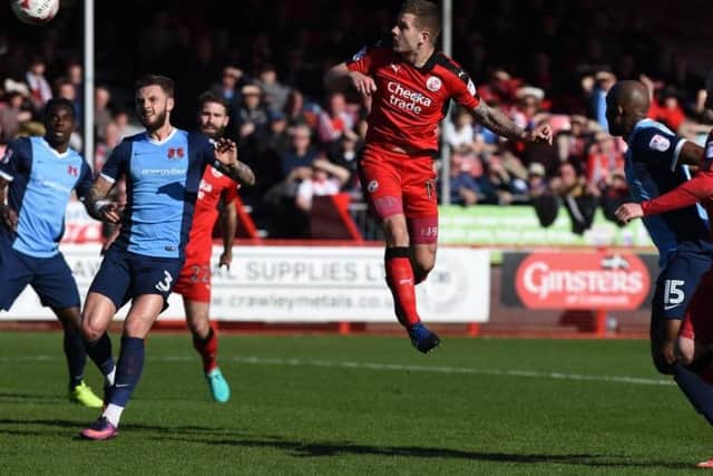 Crawley Town's James Collins scores Reds' opening goal against Leyton  Orient.
Picture by PW Sporting Photography
