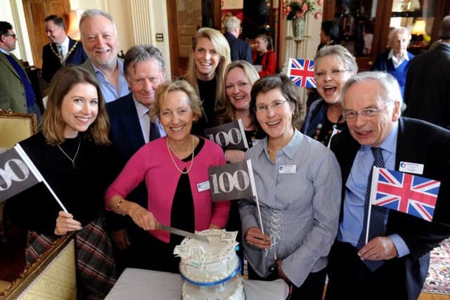 Virginia Lewis-Jones, Dame Vera Lynns daughter (centre in pink) with charity members at the tea party in Danny House last Friday (March 24). Picture: Steve Robards