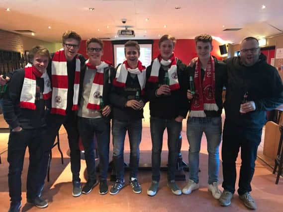 Crawley Town's Belgium fans on Saturday in Redz Bar after the game.