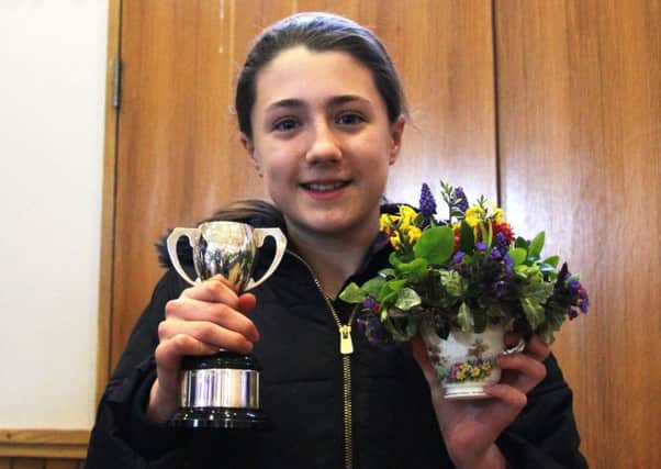 Abi Pendleton won the Knight Cup for her flower arrangement in a cup and saucer. Picture: Claudio Valentini
