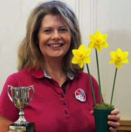 Mandy Gait won the Jack Hesling Trophy for her vase of narcissi. Picture: Claudio Valentini