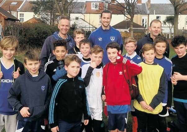 Christian Burgess joins Skilful Soccer Youth under-12s for training