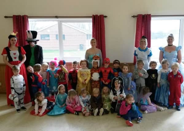 Children and staff at Jubilee Pre-School in Middleton for the dressing up day
