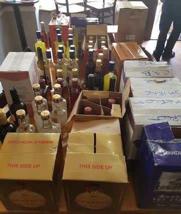 Confiscated alcohol which were seized by police (Photograph: Sussex Police) SUS-170328-135254001