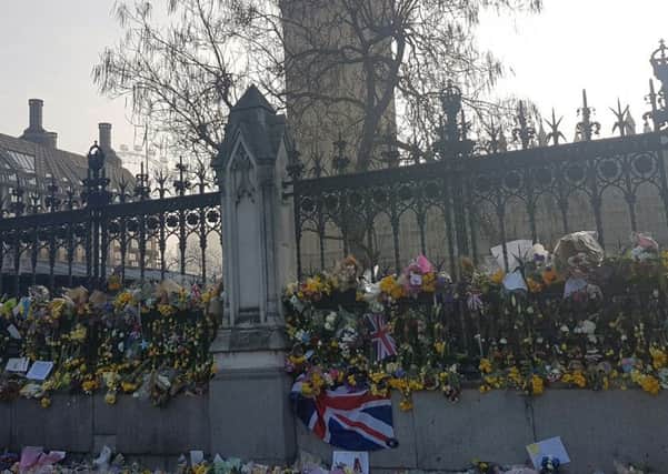 Floral tributes in Parliament Square