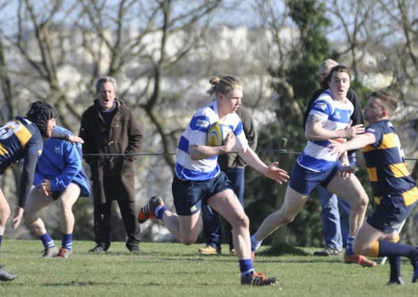 Harry Walker on the charge for Hastings & Bexhill against Old Williamsonians. Picture courtesy Nigel Baker