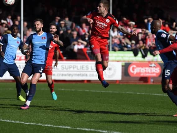 Crawley Town striker James Collins scores the opening goal during Saturday's 3-0 win against Leyton Orient.
Picture by PW Sporting Photography