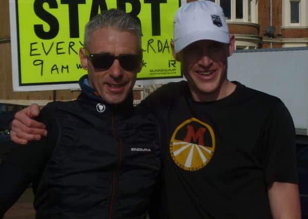 New Hastings parkrun course record holder Adam Clarke (right) with local triathlete Jamie Larkin.