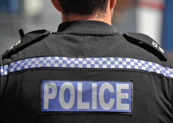 Police are appealing for witnesses to the robbery during which a man was threatened with a knife and a hammer