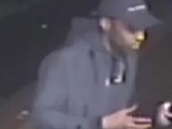 Police release CCTV of a man they want to talk to in connection with a street robbery in Brighton (Photograph: Sussex Police)