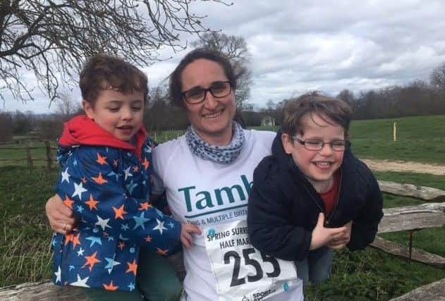 Lucy in running gear with her twin boys