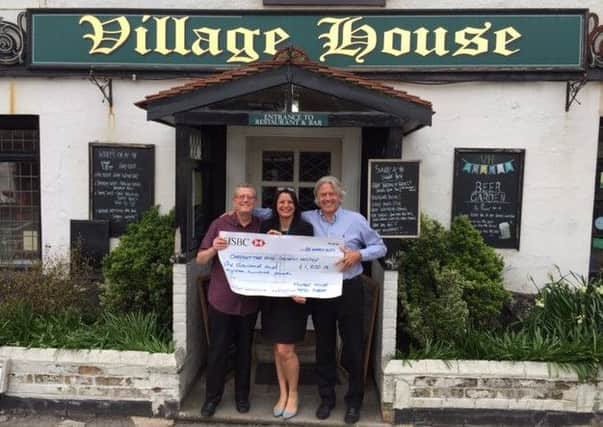 Worthing publican Tony Hills, left, and estate agent Derek Steel with Caroline Roberts-Quigley, community fundraiser at Chestnut Tree House