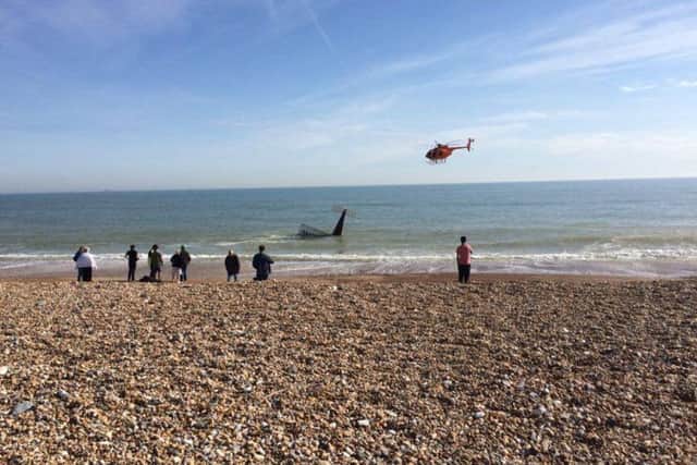 The plane crashed into the sea by the Widewater beach huts in Lancing earlier today (March 30). Picture: Andrew Rogers