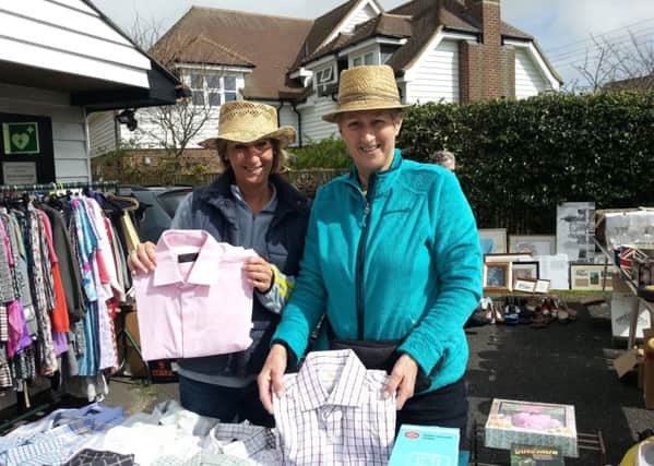 Tracy Barnett and Sue White raising funds for Gambian charity Bace at  Iden Jumble Sale SUS-170404-113820001