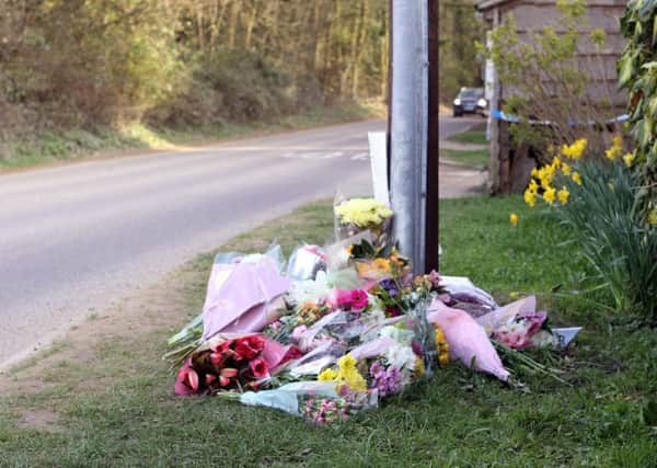 DM17315795a.jpg. Flowers left at scene of accident in Thakeham. Photo by Derek Martin SUS-170330-191410008