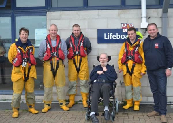Stephen Norris with Eastbourne Lifeboat crew members