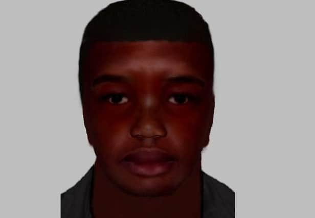 Police released an e-fit of a suspect they wish to speak to after a knifepoint robbery in Brighton