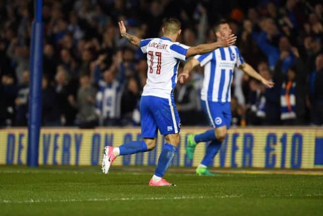 Tomer Hemed and Anthony Knockaert celebrate Brighton's second. Picture by Phil Westlake (PW Sporting Photography)