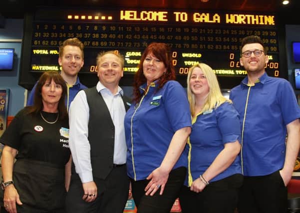 Jo Parmenter with manager Mark Watts and other Gala Bingo employees. Picture: Derek Martin DM17417239a
