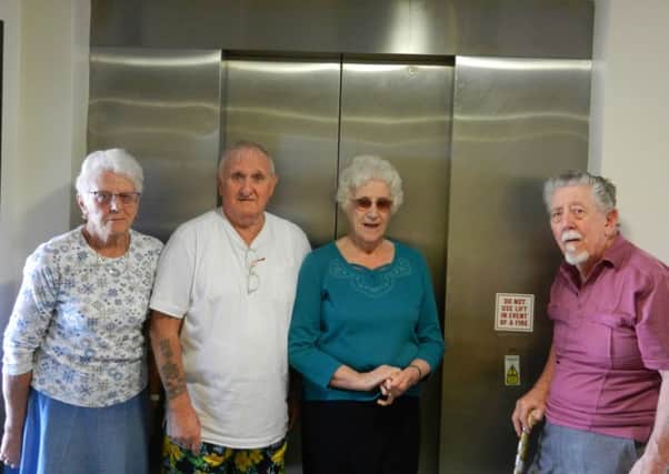 Angry Clifton Court residents standing on the second floor by the broken lift