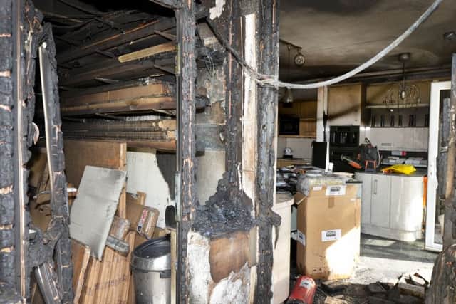 Fire damage at R & R Kitchens, Sidley. SUS-170504-150952001