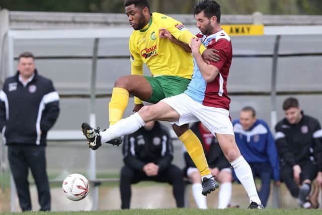 Ollie Rowe effects a tackle against Godalming. Picture courtesy Scott White
