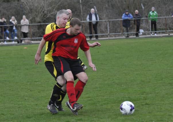 Rob Levett on the ball during Rye Town's last match, against Icklesham Casuals.