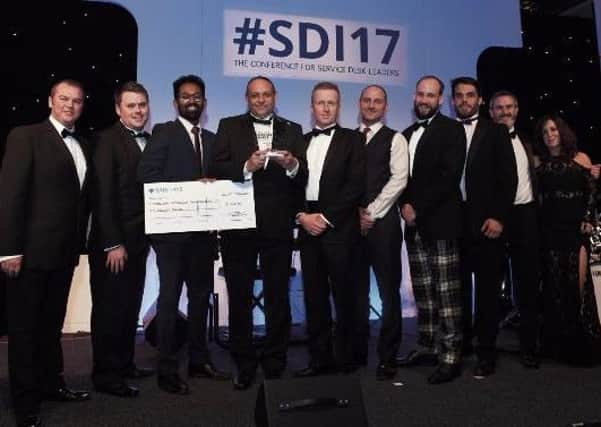 Western Sussex Hospitals NHS Foundation Trust IT team receiving their award for Best Implementation of an IT Service Management Solution