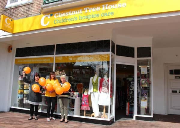 Staff and volunteers outside the new Goring Road shop