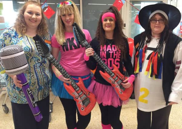 An '80s-style flash mob at Sainsbury's Hampden Park in aid of Comic Relief
