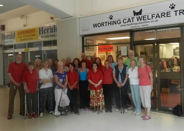 The team at Worthing Cat Welfare Trust outside the now closed shop in the Guildbourne Centre