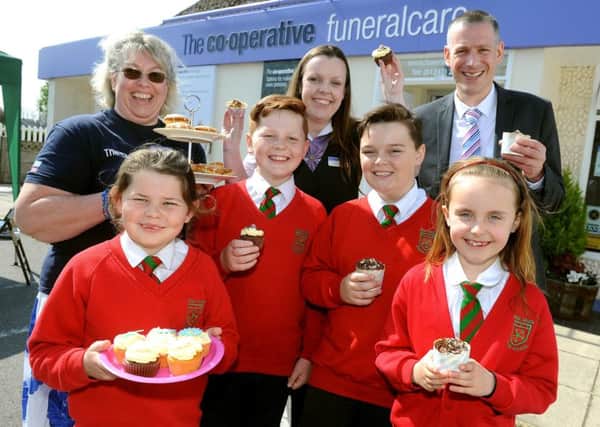 Cake stall to raise money for Rose Green Junior School at The Co-operative Funeralcare, Nyetimber Lane, Rose Green. Picture: Steve Robards SR1706568