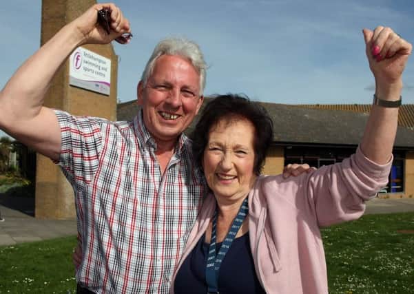 Ann Lizzimore took part in a swimathon at Littlehampton swimming centre. Pictured with her husband Bryan. Picture: Derek Martin