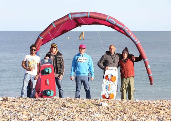 Olly Lawrence (centre) and other kitesurfers welcome Moby Dig to their ranks. Picture: Eddie Mitchell