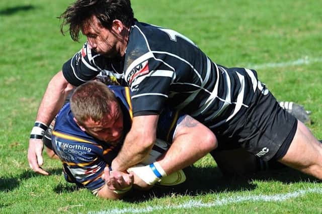 Grant Gatford goes over for Raiders against Chinnor. Picture by Stephen Goodger